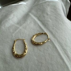 Intricate gold hoops